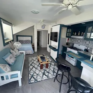 https://scarlett-studios-modern-and-cozy-studio-in-great-location.comcaribbean.com